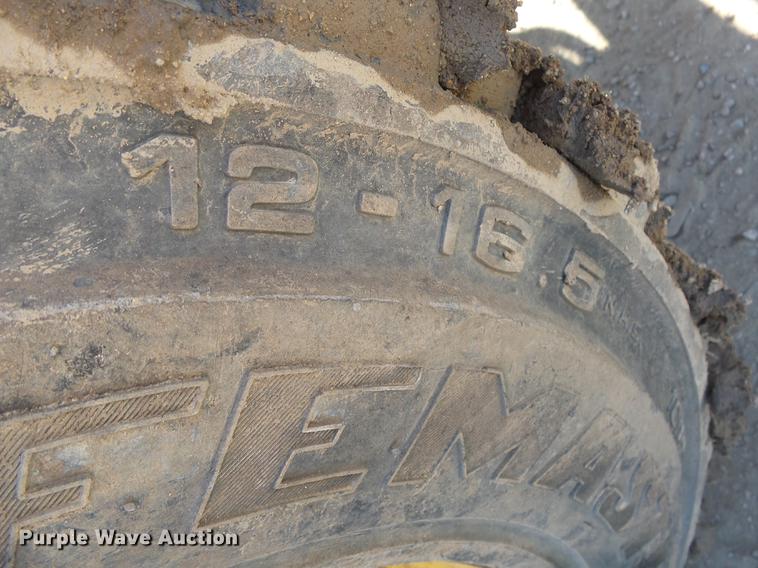 image for item EF9519 1996 John Deere 310D backhoe