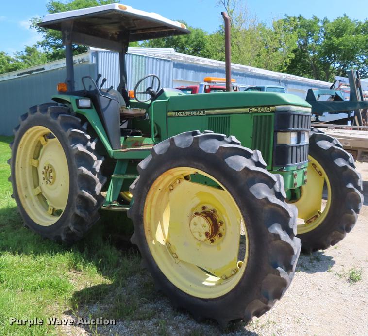image for item DE3518 1993 John Deere 6300 MFWD tractor