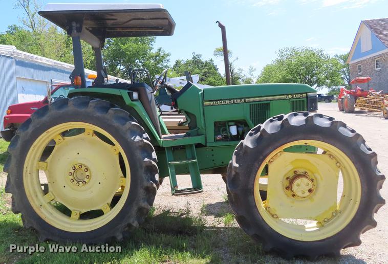 image for item DE3518 1993 John Deere 6300 MFWD tractor