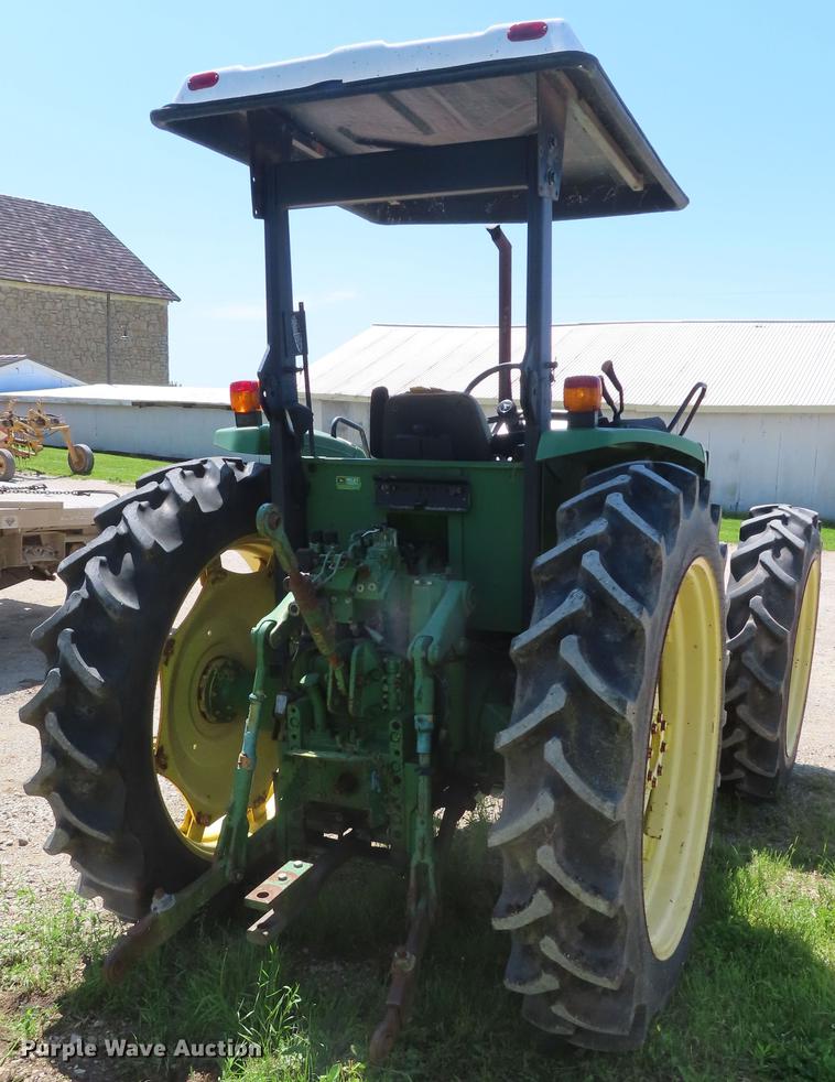image for item DE3518 1993 John Deere 6300 MFWD tractor