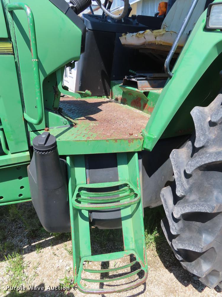 image for item DE3518 1993 John Deere 6300 MFWD tractor