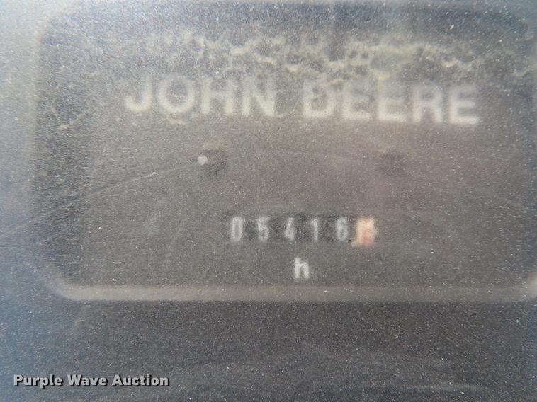 image for item DE3518 1993 John Deere 6300 MFWD tractor