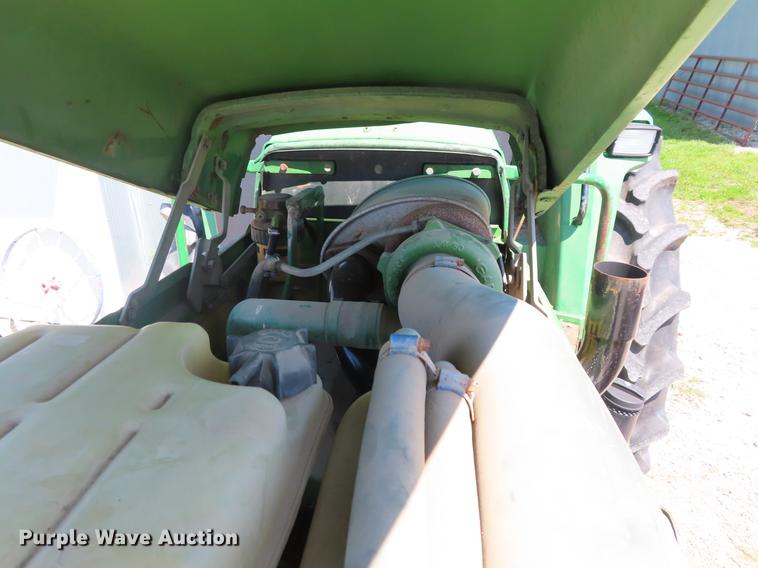 image for item DE3518 1993 John Deere 6300 MFWD tractor