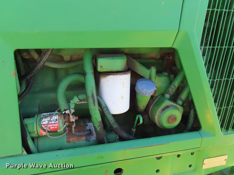 image for item DE3518 1993 John Deere 6300 MFWD tractor