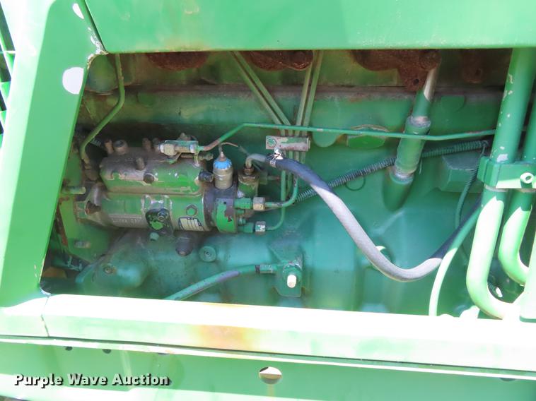 image for item DE3518 1993 John Deere 6300 MFWD tractor