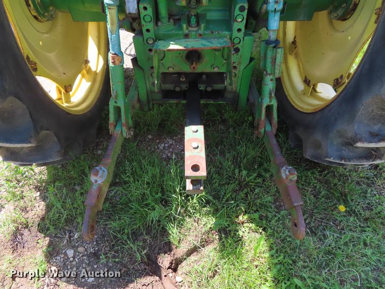 image for item DE3518 1993 John Deere 6300 MFWD tractor