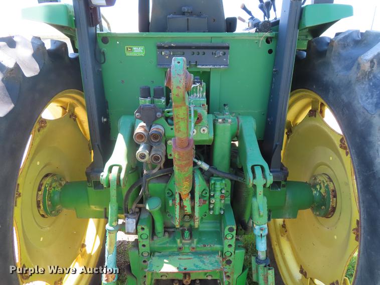 image for item DE3518 1993 John Deere 6300 MFWD tractor