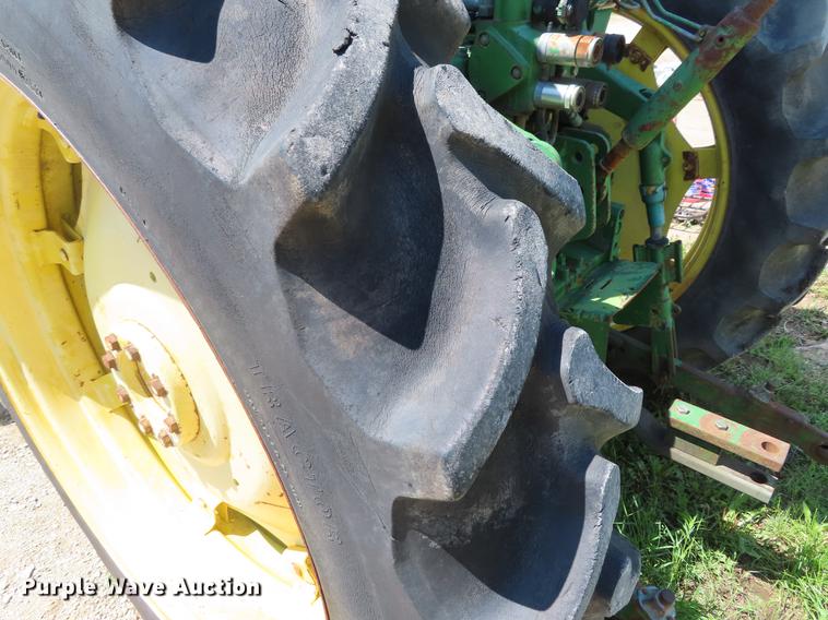 image for item DE3518 1993 John Deere 6300 MFWD tractor
