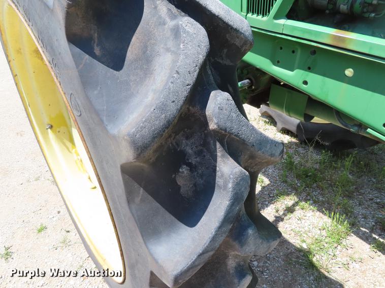 image for item DE3518 1993 John Deere 6300 MFWD tractor