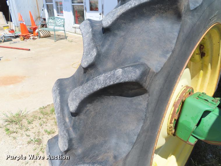 image for item DE3518 1993 John Deere 6300 MFWD tractor