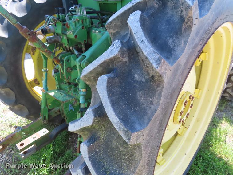 image for item DE3518 1993 John Deere 6300 MFWD tractor