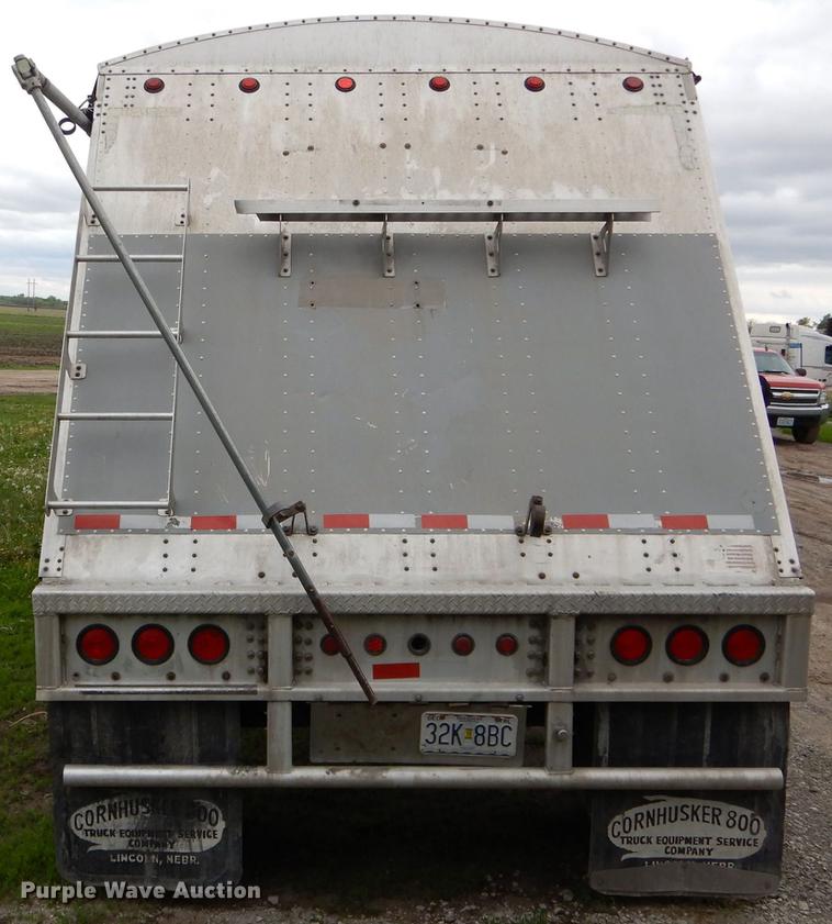 image for item DE8391 2002 Corn Husker double hopper bottom grain trailer