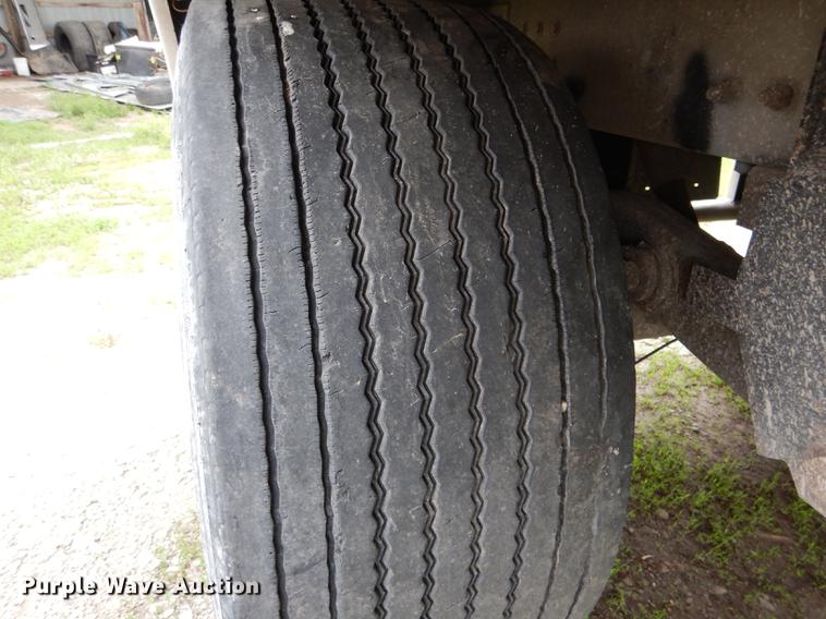 image for item DE8391 2002 Corn Husker double hopper bottom grain trailer