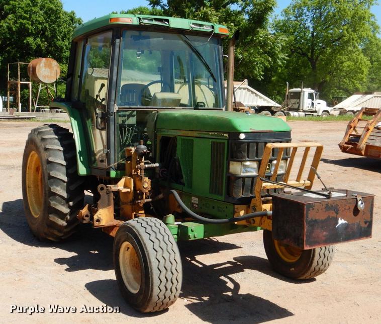image for item DE3962 2001 John Deere 6310 tractor