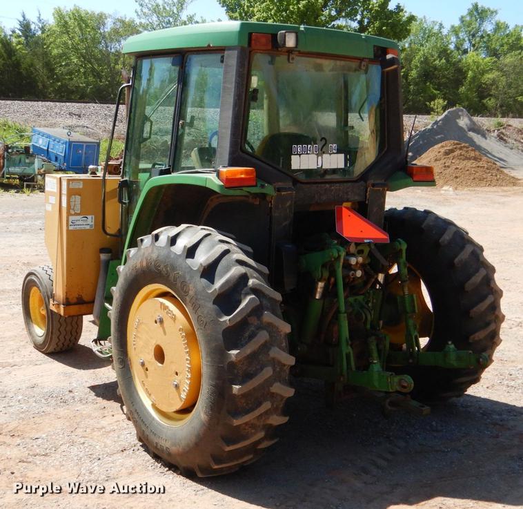 image for item DE3962 2001 John Deere 6310 tractor
