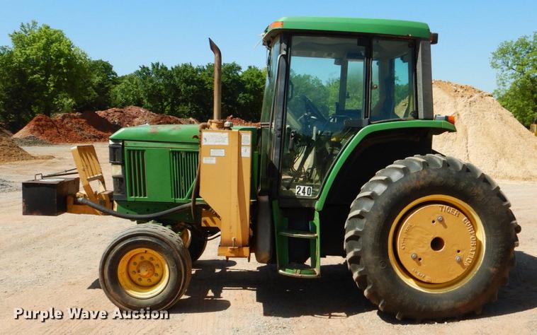 image for item DE3962 2001 John Deere 6310 tractor