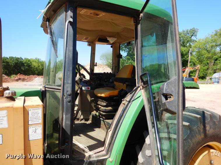 image for item DE3962 2001 John Deere 6310 tractor