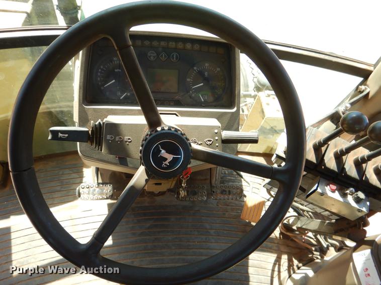 image for item DE3962 2001 John Deere 6310 tractor