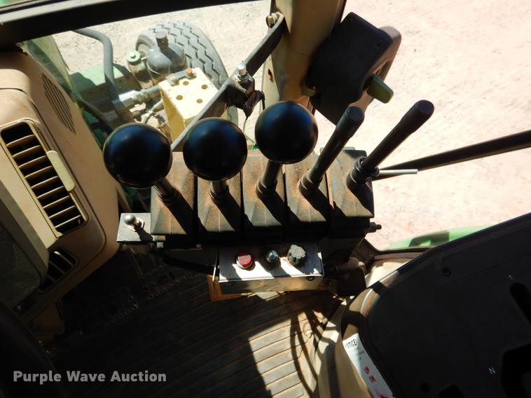 image for item DE3962 2001 John Deere 6310 tractor