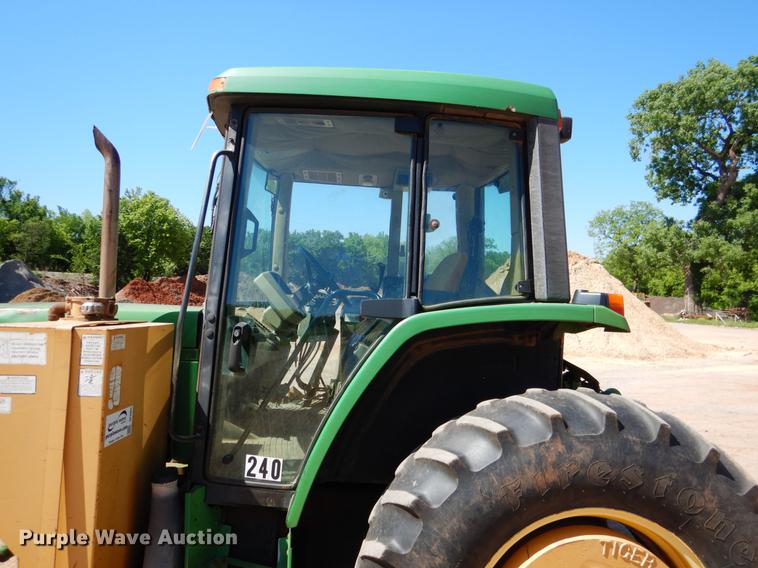 image for item DE3962 2001 John Deere 6310 tractor