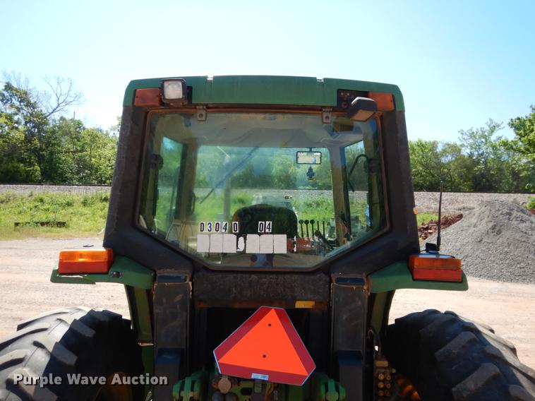 image for item DE3962 2001 John Deere 6310 tractor