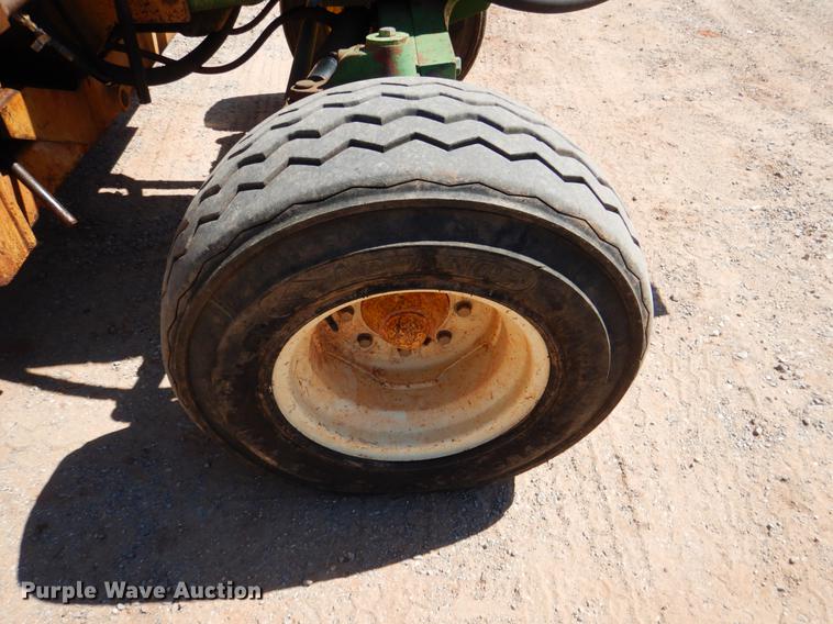 image for item DE3962 2001 John Deere 6310 tractor