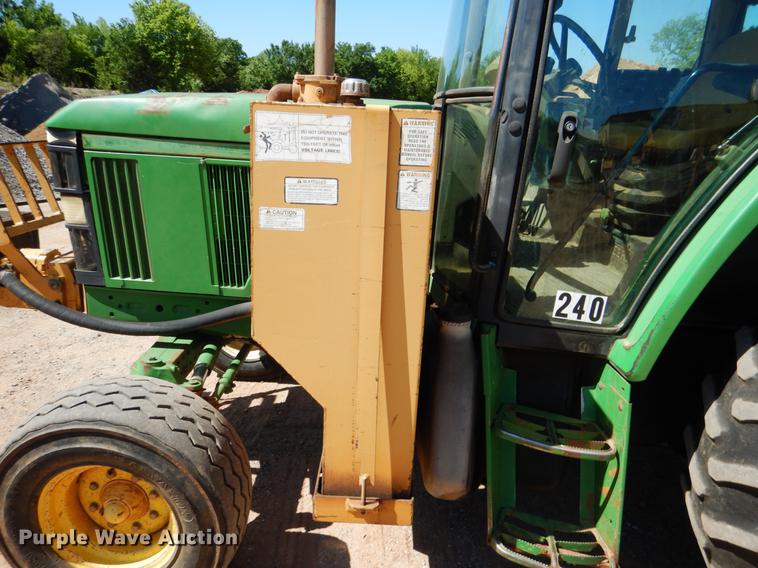 image for item DE3962 2001 John Deere 6310 tractor