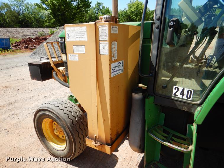 image for item DE3962 2001 John Deere 6310 tractor