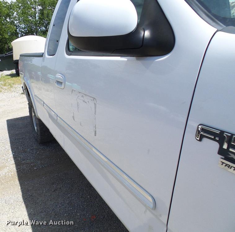 image for item DF7308 1998 Ford F150 SuperCab pickup truck