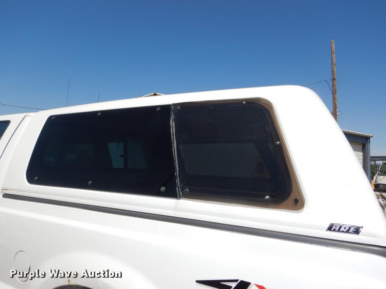 image for item DG1096 1999 Ford F250 Super Duty XLT Crew Cab pickup truck