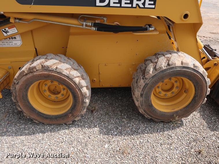 image for item DG3475 2008 John Deere 325 skid steer
