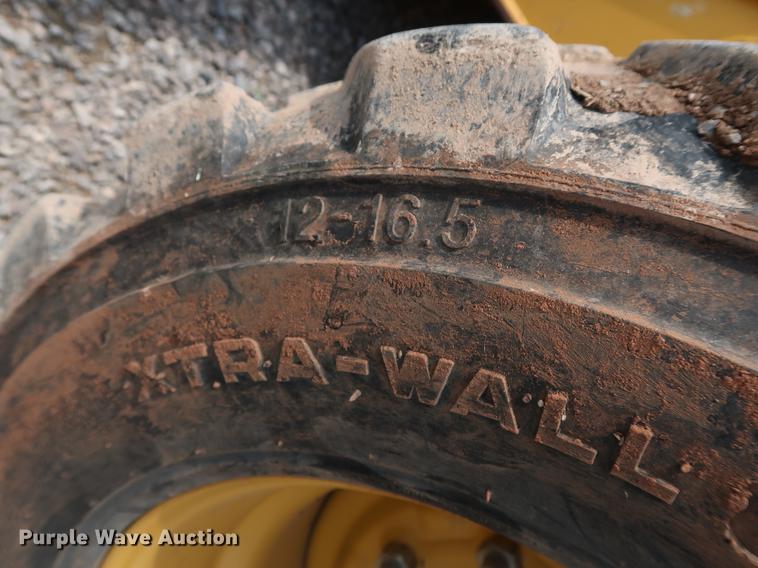 image for item DG3475 2008 John Deere 325 skid steer