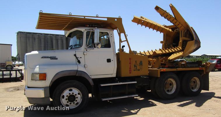 image for item DB4944 1995 Ford L9000 truck with Big John tree transplanter