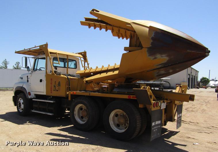 image for item DB4944 1995 Ford L9000 truck with Big John tree transplanter