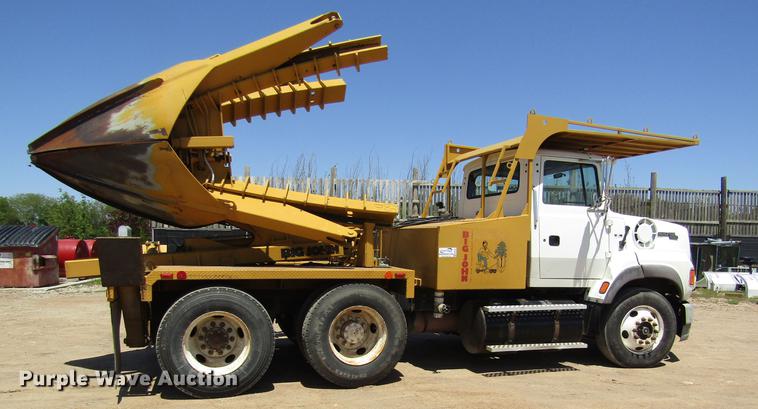 image for item DB4944 1995 Ford L9000 truck with Big John tree transplanter