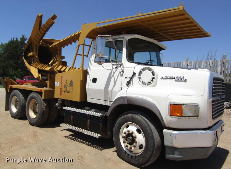 image for item DB4944 1995 Ford L9000 truck with Big John tree transplanter
