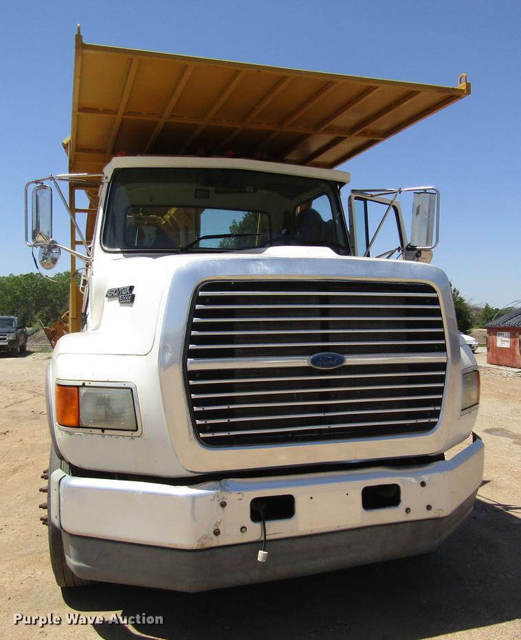 image for item DB4944 1995 Ford L9000 truck with Big John tree transplanter