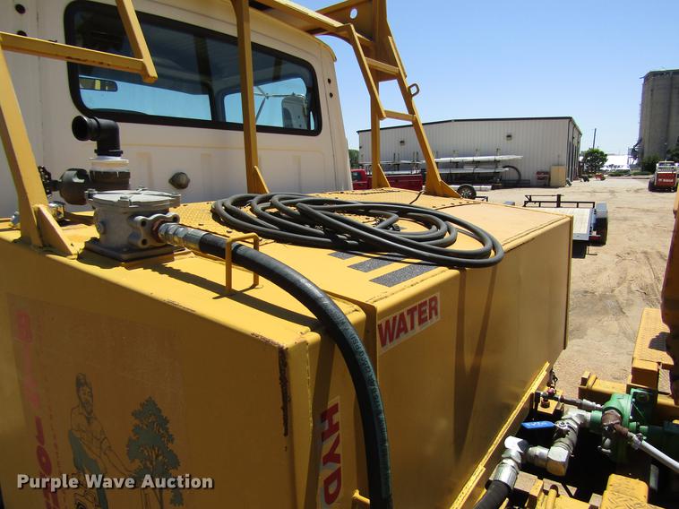 image for item DB4944 1995 Ford L9000 truck with Big John tree transplanter