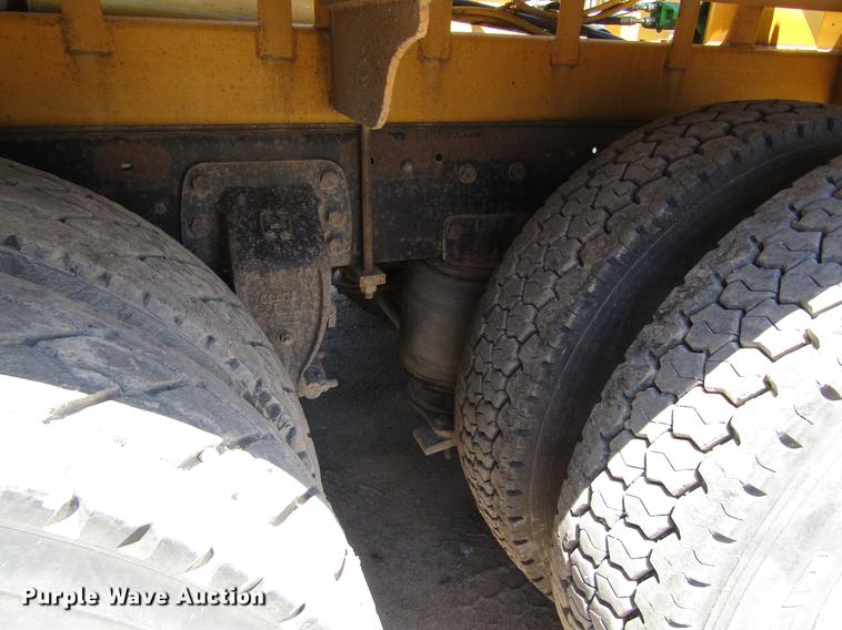 image for item DB4944 1995 Ford L9000 truck with Big John tree transplanter