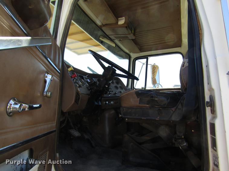 image for item DB4944 1995 Ford L9000 truck with Big John tree transplanter