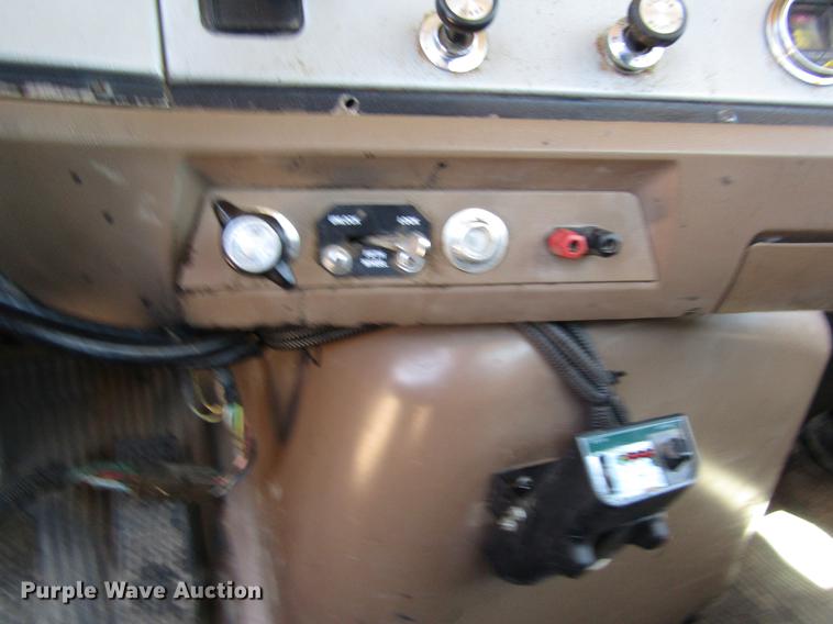 image for item DB4944 1995 Ford L9000 truck with Big John tree transplanter