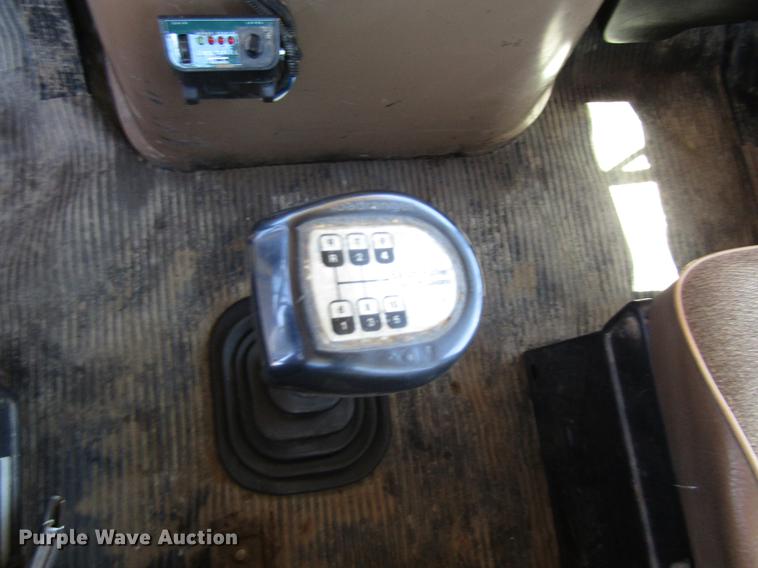 image for item DB4944 1995 Ford L9000 truck with Big John tree transplanter