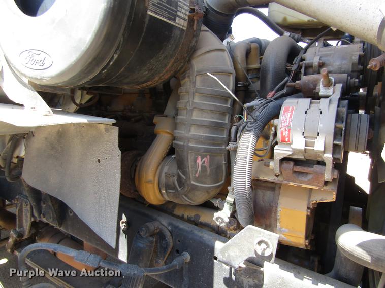 image for item DB4944 1995 Ford L9000 truck with Big John tree transplanter