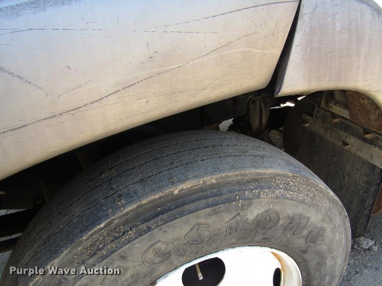 image for item DB4944 1995 Ford L9000 truck with Big John tree transplanter