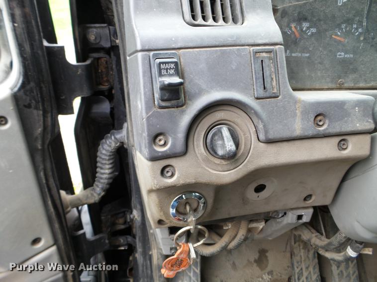 image for item DC4575 1999 Sterling L8500 flatbed truck