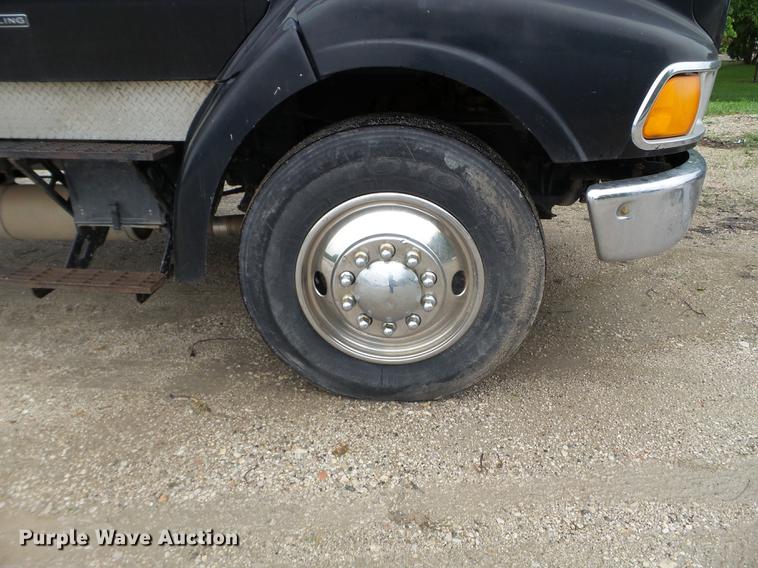 image for item DC4575 1999 Sterling L8500 flatbed truck