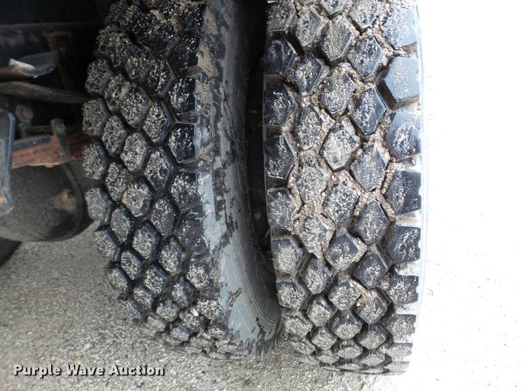 image for item DC4575 1999 Sterling L8500 flatbed truck