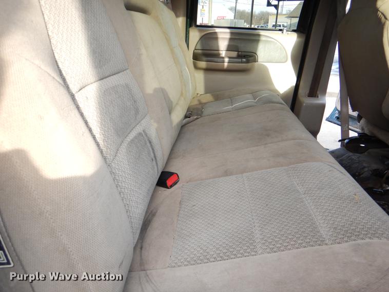 image for item DD8973 2002 Ford F350 Super Duty Crew Cab flatbed pickup truck