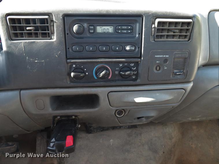 image for item DE8043 2003 Ford F450 Super Duty XL flatbed truck