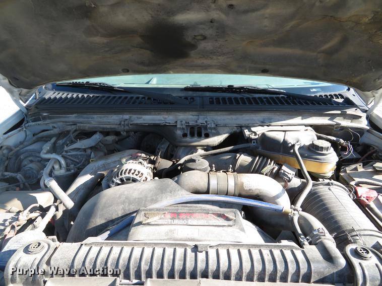 image for item DE8043 2003 Ford F450 Super Duty XL flatbed truck